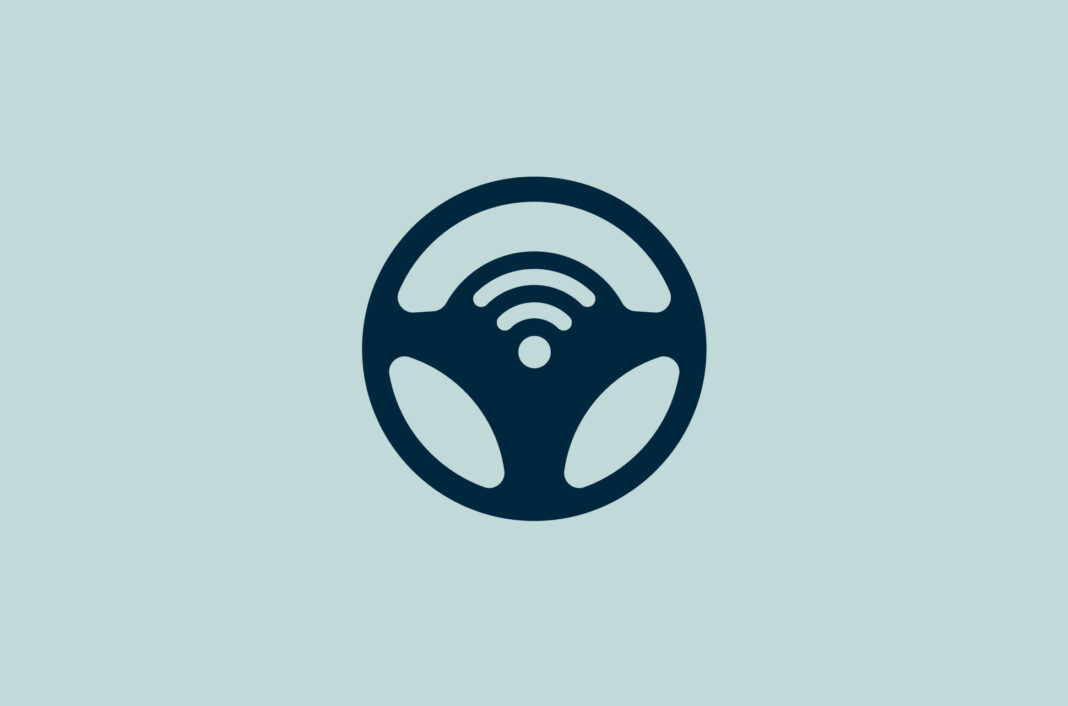 Steering wheel with Wi-Fi symbol.